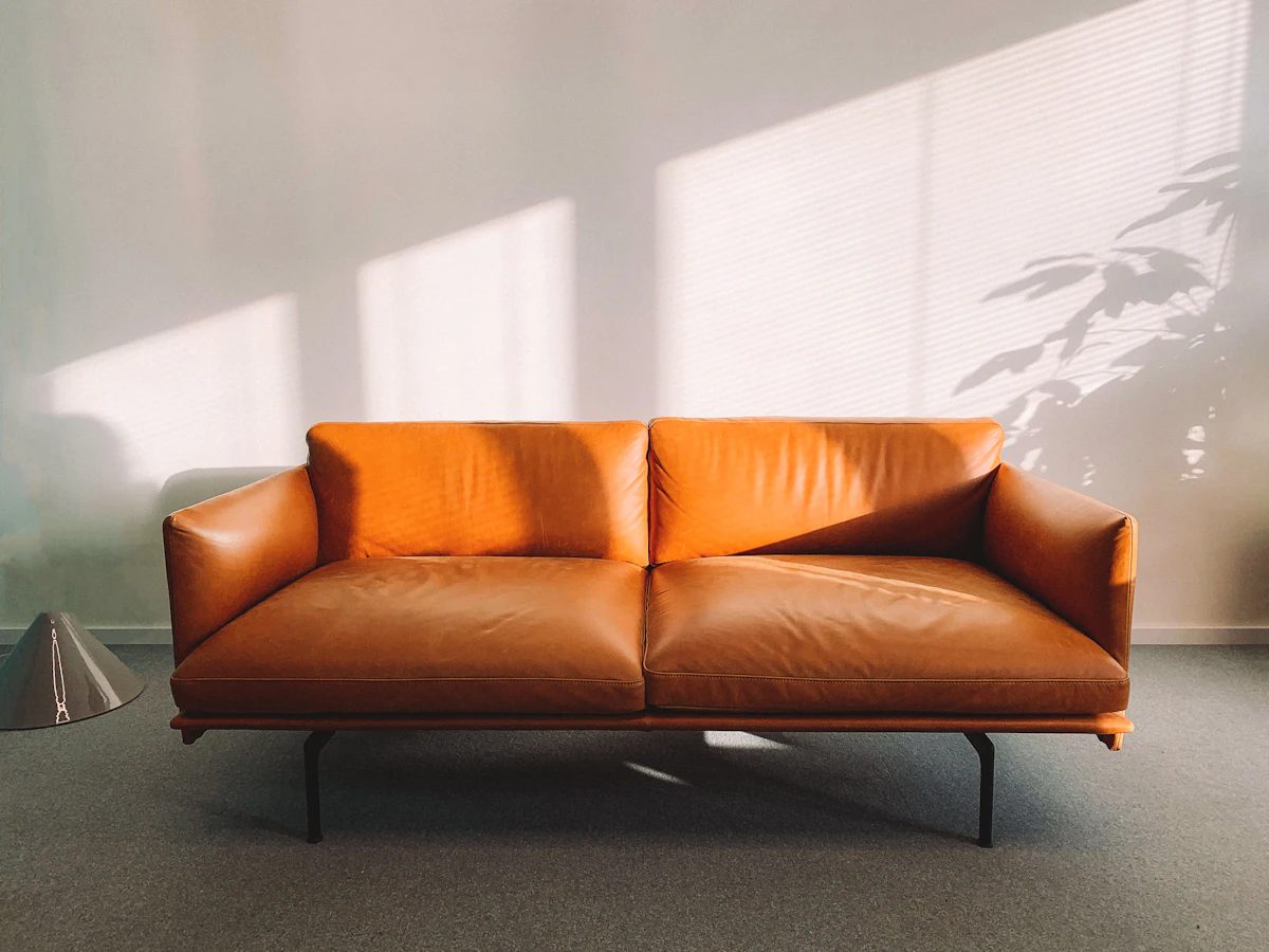 Cognac leather sofa in afternoon light